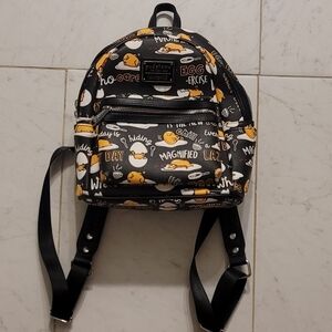 Loungefly Sanrio Gudetama The Lazy Egg  All Over Print Backpack